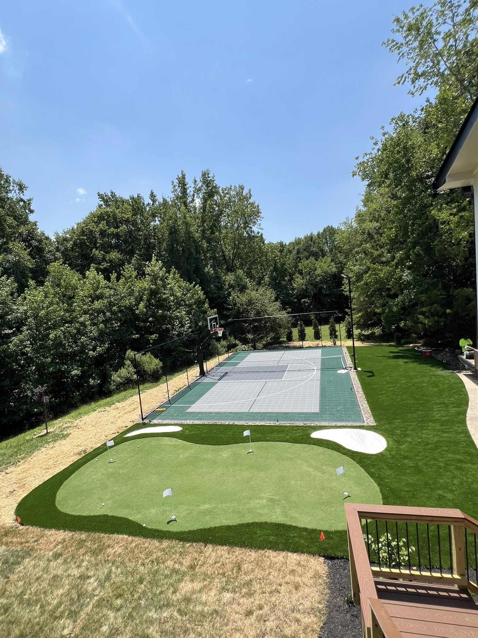 Backyard Tennis Court & Putting Green Combo