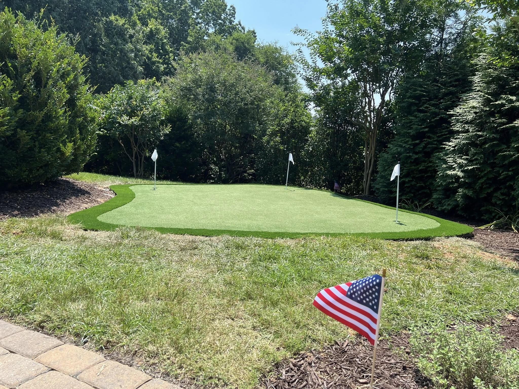 Residential Putting Green with Patriotic Touch